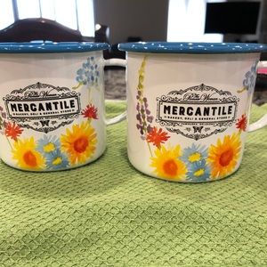 Never been used. 2 Tin. Pioneer woman coffee mugs.